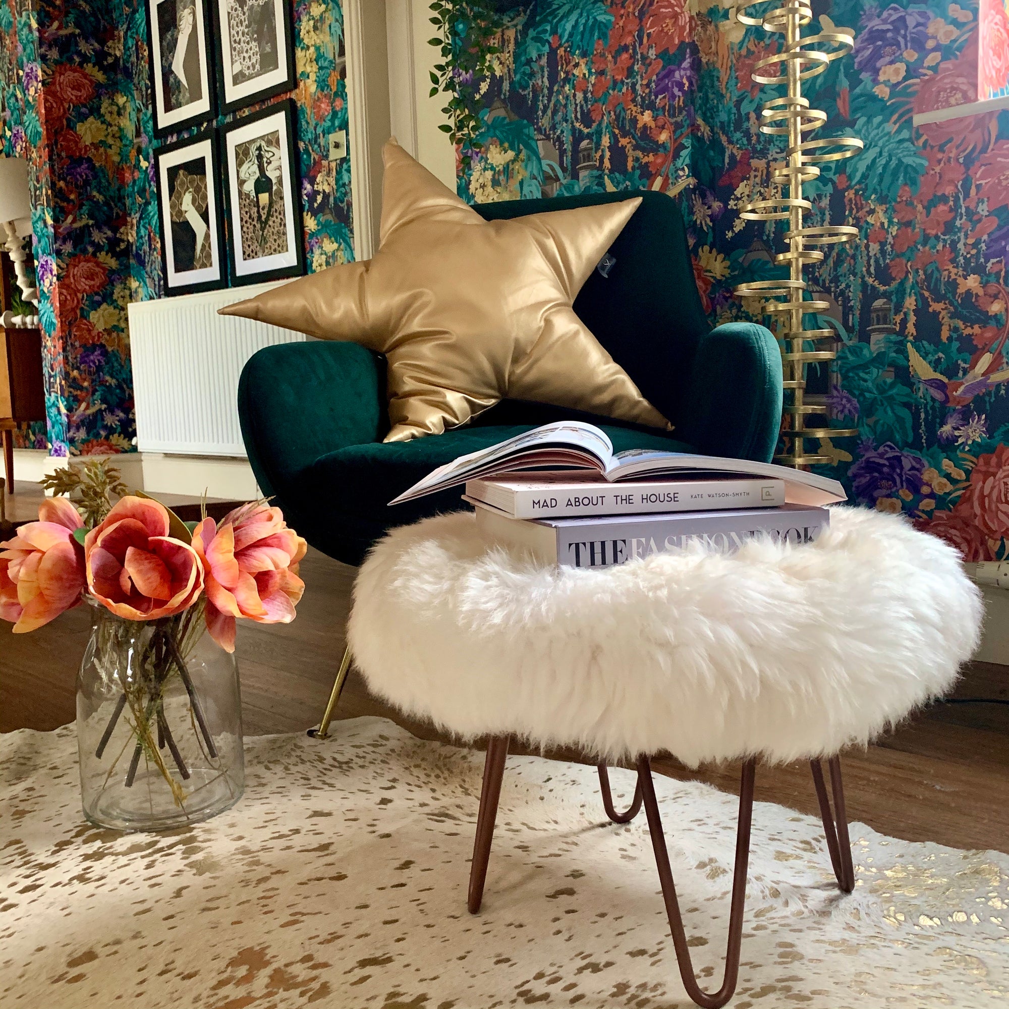 round sheepskin pouffe footstool with copper hairpin legs 
