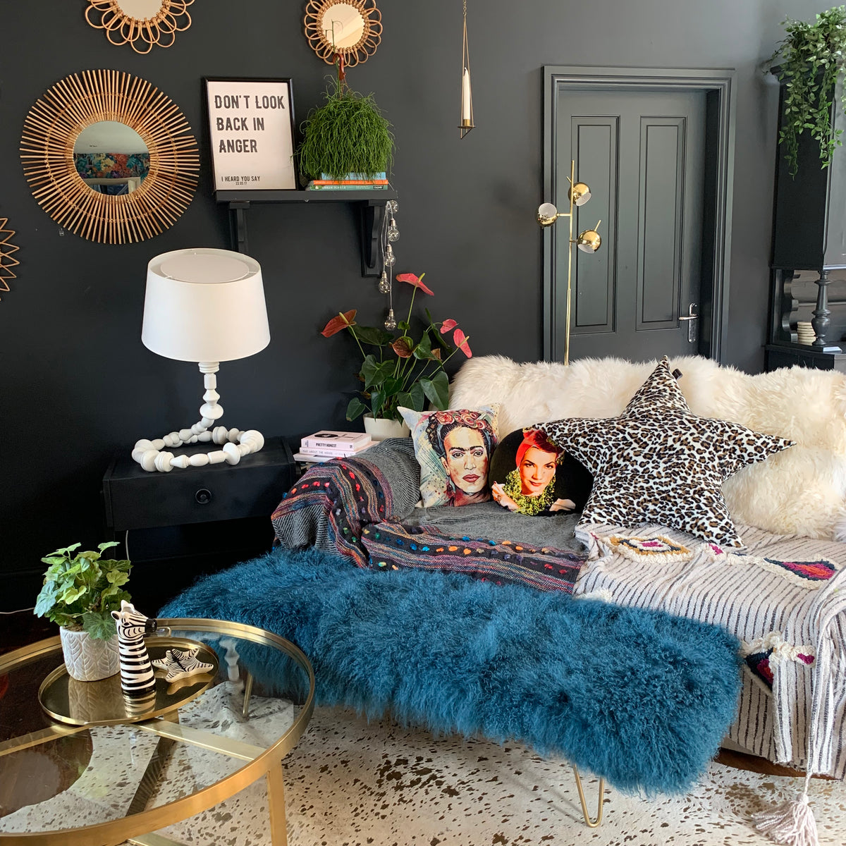 Teal turquoise mongolian sheepskin upholstered footstool with gold hairpin legs  Edit alt text