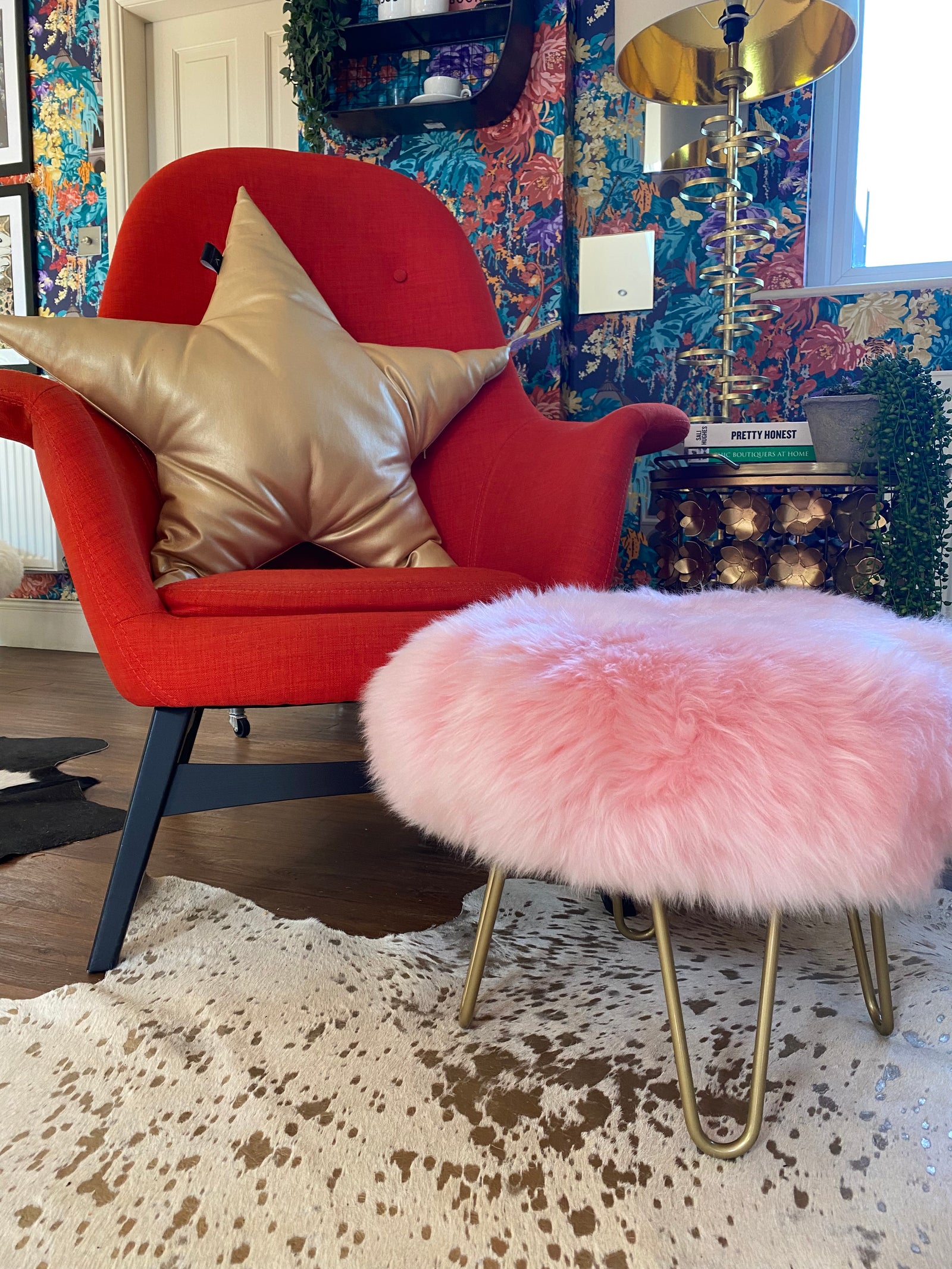 round sheepskin footstool pouffe hairpin leg  Edit alt text