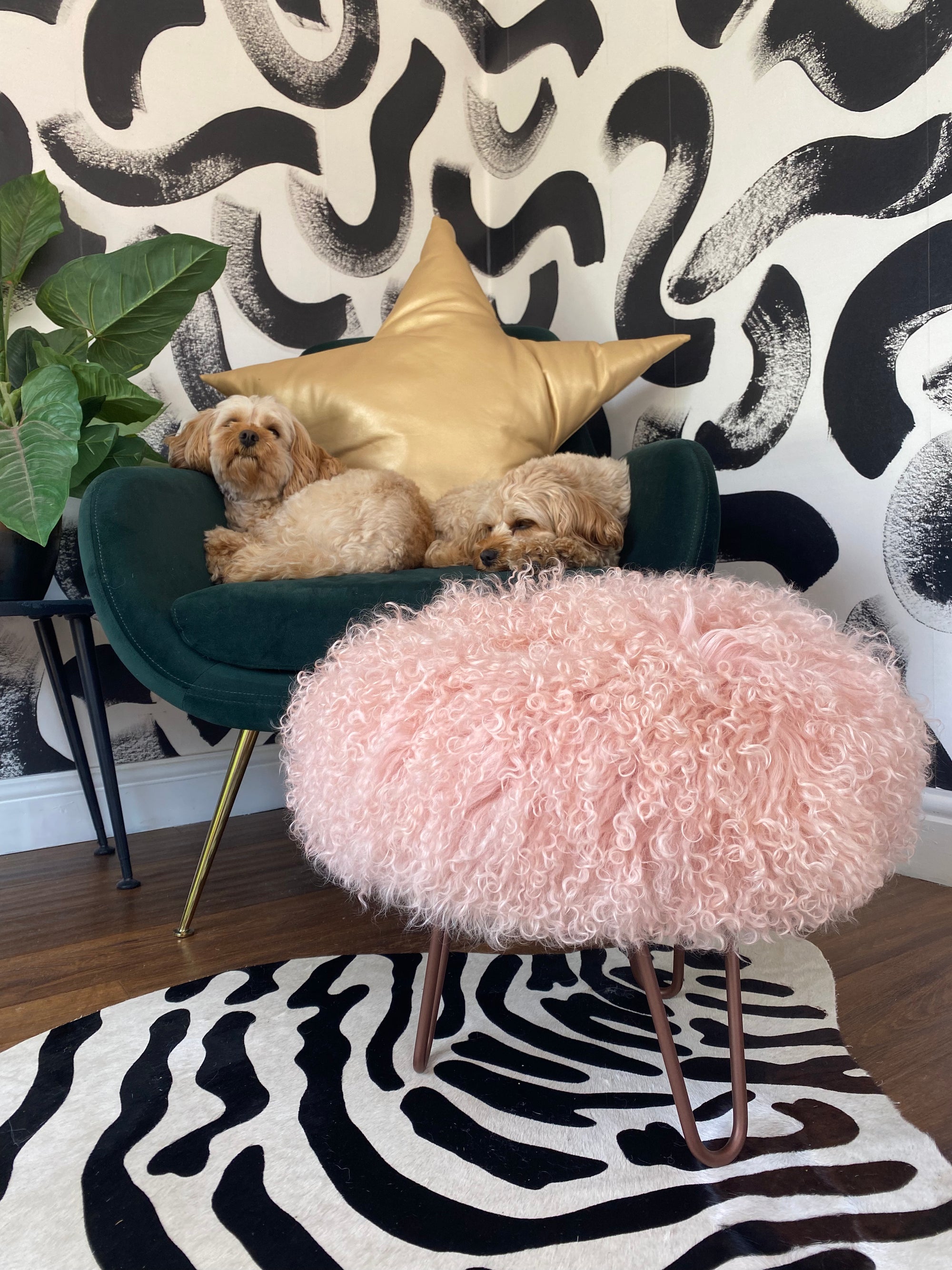 Small round Mongolian Sheepskin upholstered footstool with hairpin legs