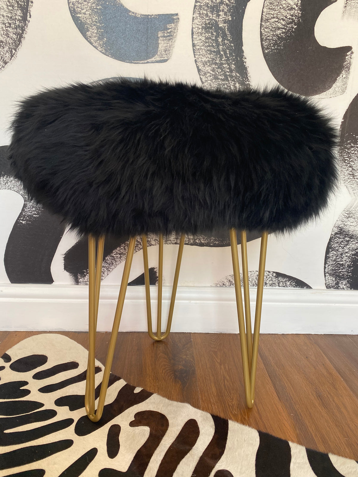 black sheepskin stool