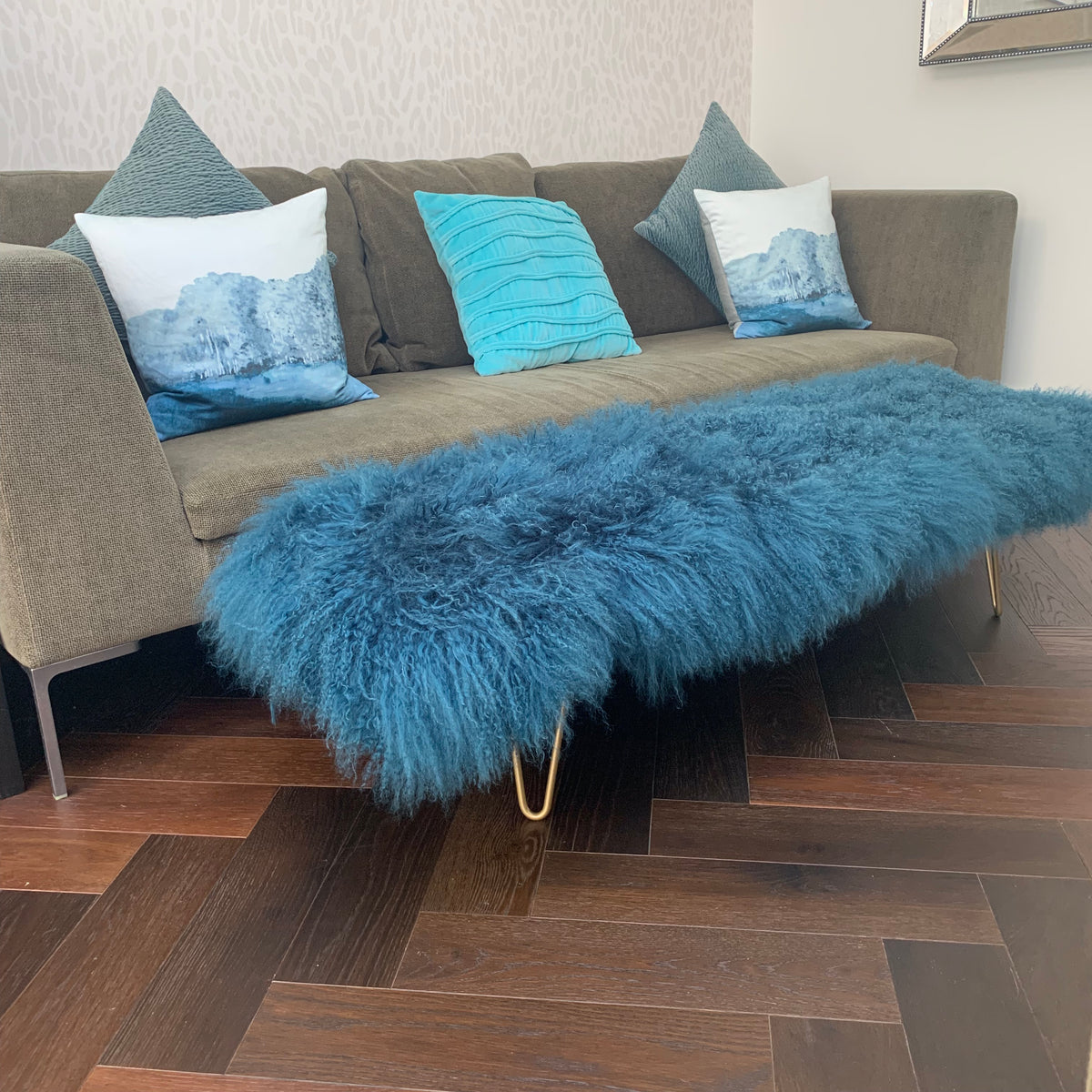Teal turquoise mongolian sheepskin upholstered footstool with gold hairpin legs  Edit alt text