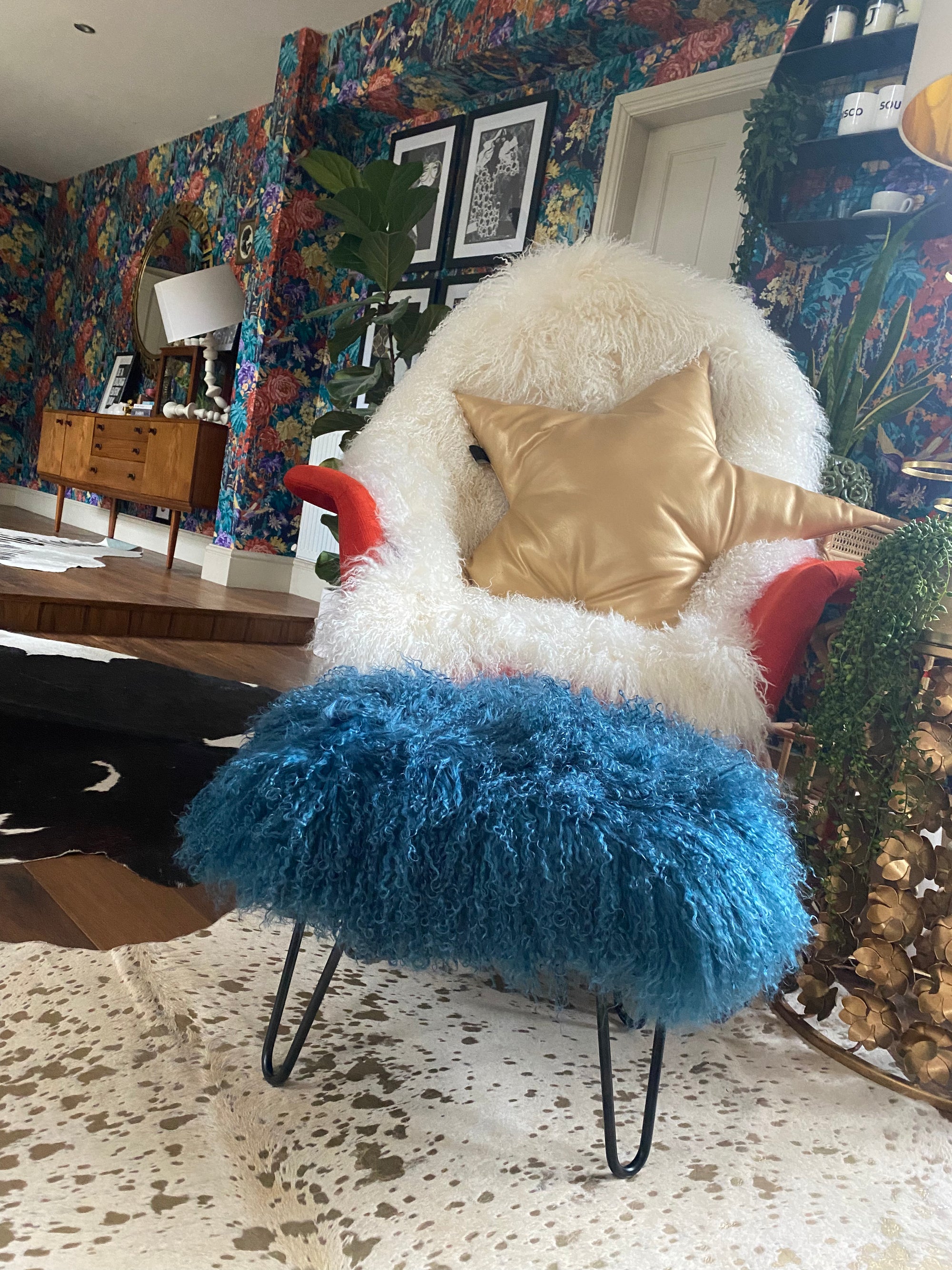 small mongolian footstool in teal