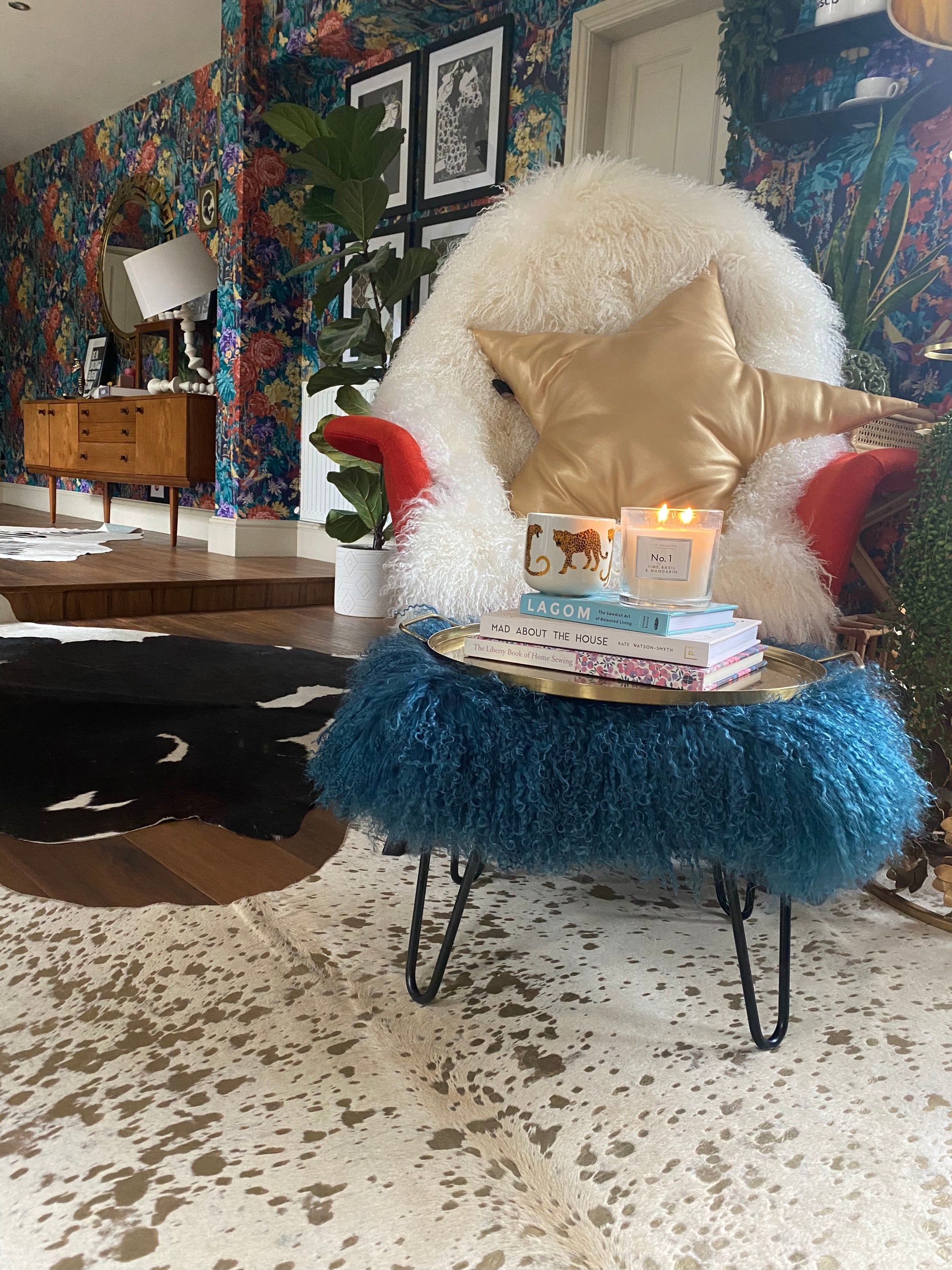 small mongolian footstool in teal