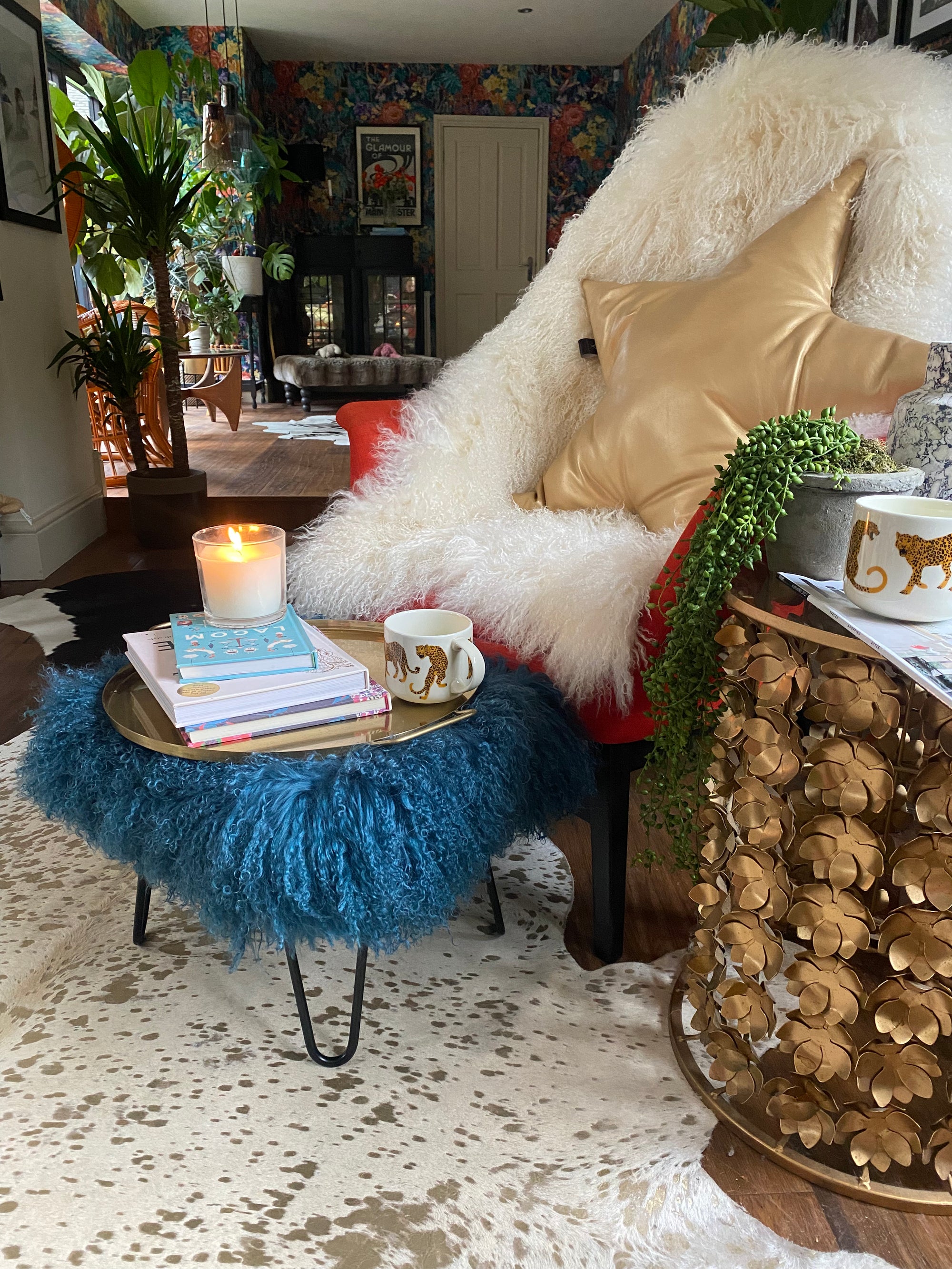 small mongolian footstool in teal