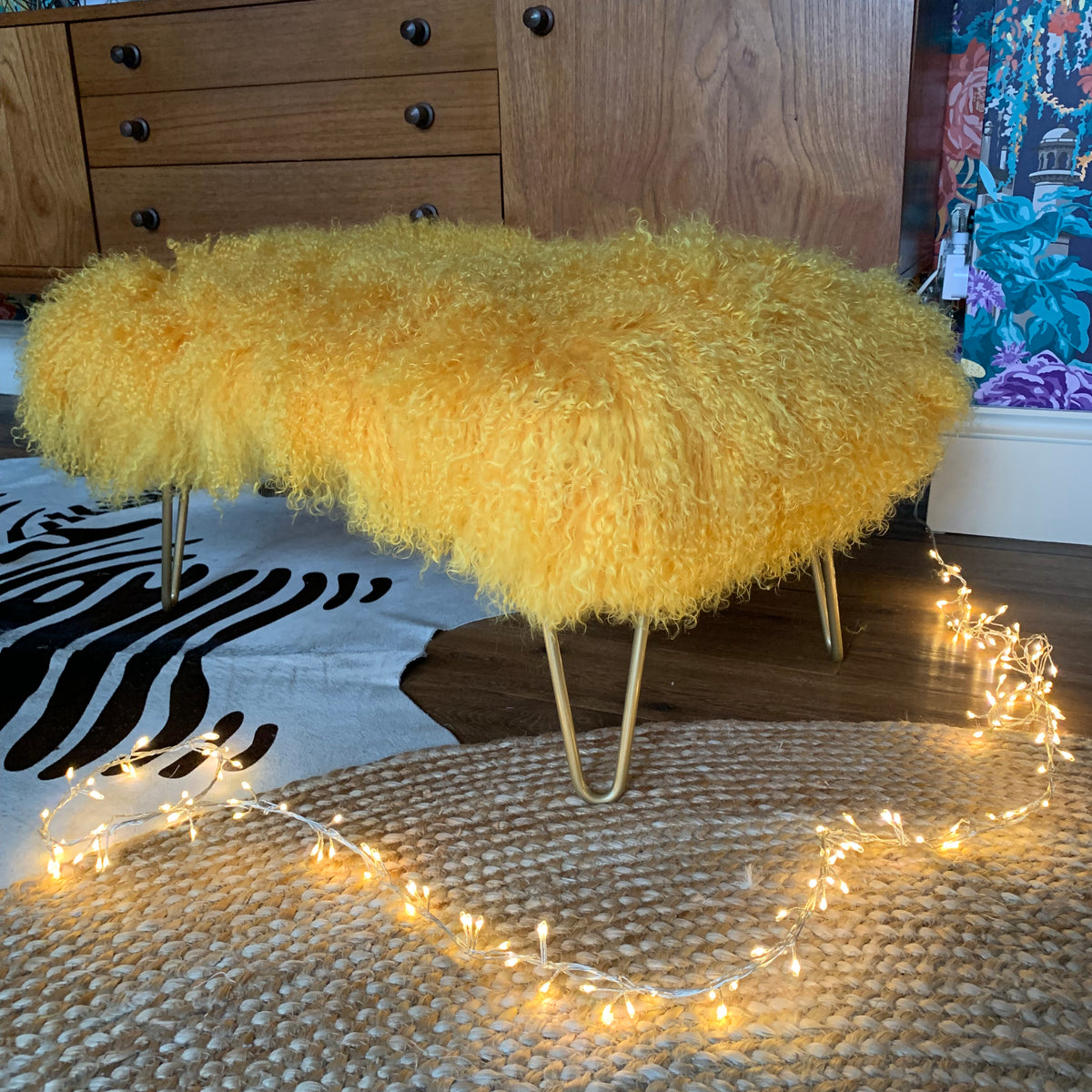 mustard mongolian upholstered footstool with hairpin legs 