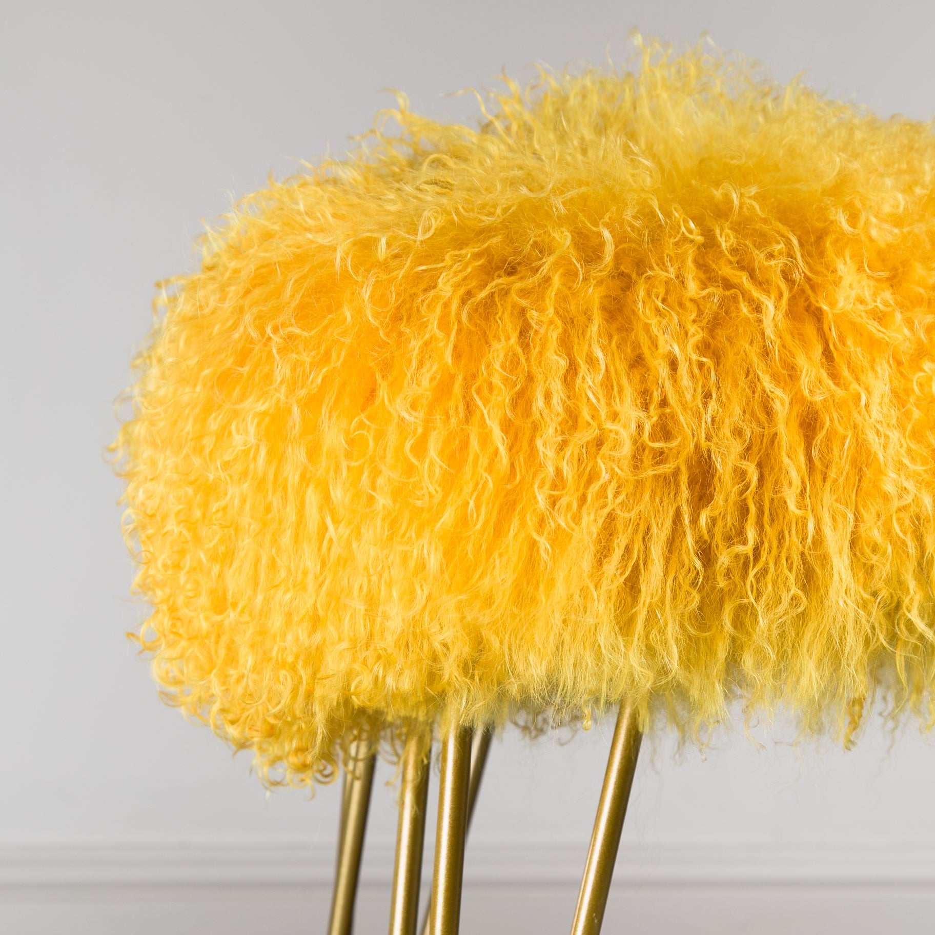 mustard mongolian sheepskin bench with hairpin legs